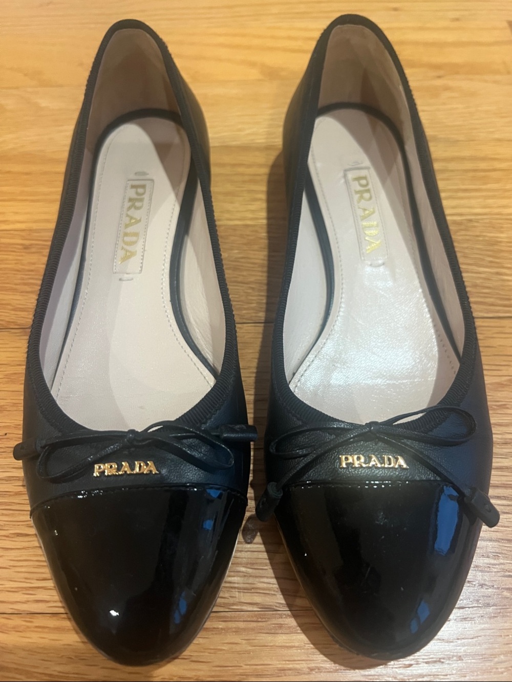 Prada Black Leather Ballet Flats.  Patent Cap Toe & Bow. With Dustbags. 6.5.